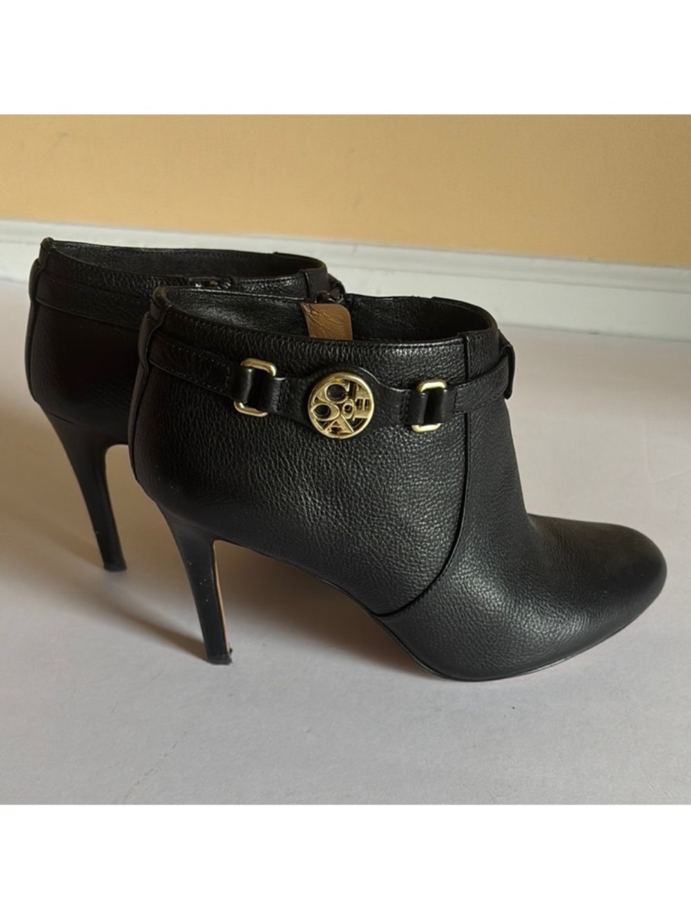 Coach leather booties with side gold logo